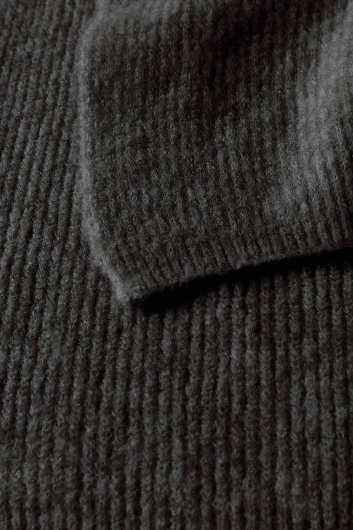 Texture close-up of Foulard Solla fabric in dark color, showcasing its soft knit material and classic cut.