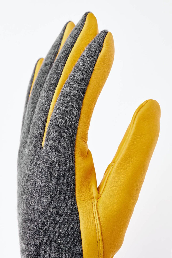 Gant en daim et tricot de laine avec doublure chaude, cuir de chèvre et manchette isolante.