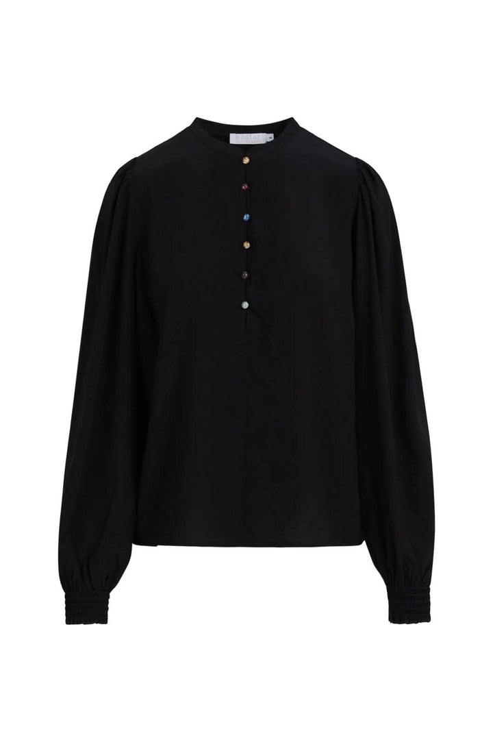 Top noir avec col mandarin et boutons multicolores, manches longues et coupe ample.