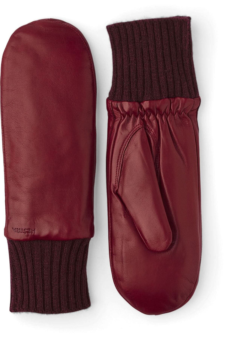 Mitaines Tina en cuir de mouton rouge, doublées de Primaloft, avec poignets en tricot côtelé.