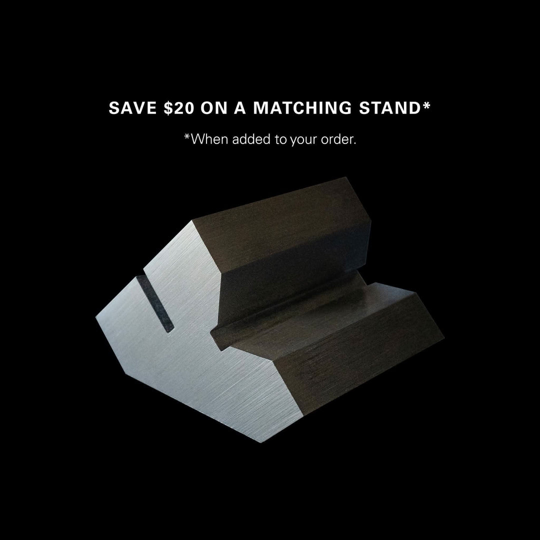 Promotion announcing $20 discount on matching stand with crayon purchase, featuring an elegant metal stand.