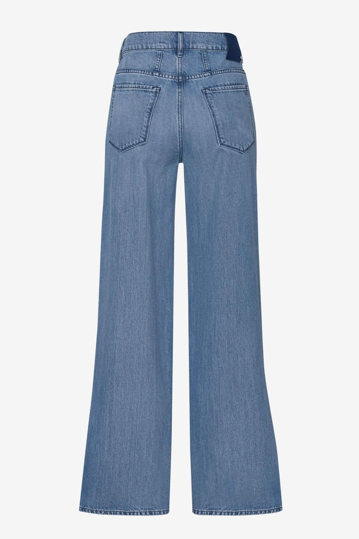Pantalon Maine en denim bleu, vue arrière, avec coupe large et poches élégantes.