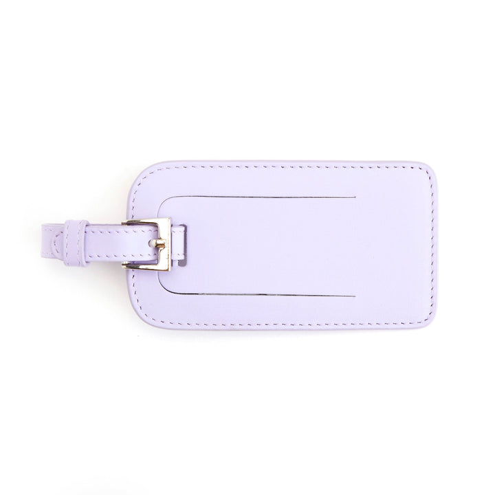 Étiquette à bagages en cuir violet avec boucle, design élégant pour voyager avec style.